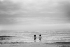 Lake Michigan beach portrait of siblings in the water