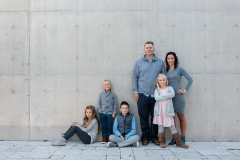 A beautiful family poses together for downtown Grand Rapids portraits