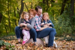 Grand Rapids fall color provides a beautiful backdrop for a family portrait