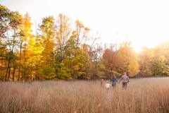 A fall West Michigan field provides a beautiful environment for this lifestyle family portrait