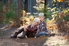 Portrait of two children in a Michigan woods