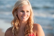Grand Haven senior at sunset on a Lake Michigan beach for senior pictures
