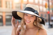 Senior portrait of girl with a hat in downtown Grand Rapids