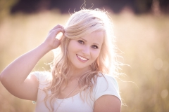 Backlit senior photo picture in a summer Grand Rapids field