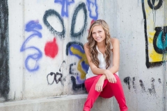 Grand Rapids senior portrait photographers image of girl by graffiti