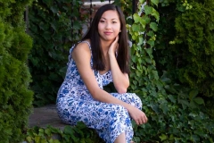 Portrait of West Michigan high school senior girl in ivy covered doorway