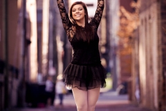 Ballerina poses for photo in an urban Grand Rapids senior portrait