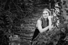 Senior portrait of young woman in urban Grand Rapids setting