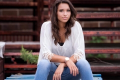 Urban senior portrait of a beautiful senior girl near Grand Rapids