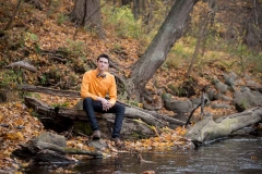 Grand Rapids senior portrait of a male teen boy in Michigan fall color