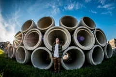 Creative fisheye senior portrait of Grand Rapids boy