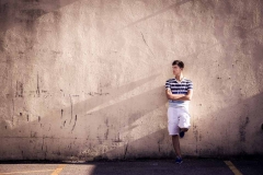 Male senior portrait of a boy in downtown Grand Rapids