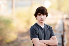 Senior portrait nea of guy and fall color near Grand Rapids